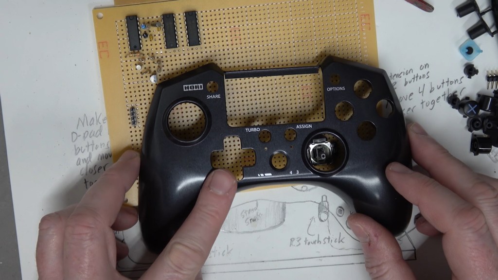 The front panel of a Horipad PS4 controller.