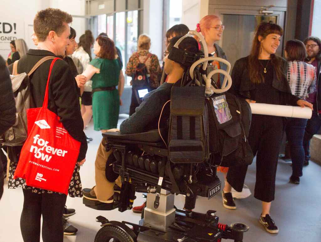 Talking to Peta from the Art Council with people enjoying the Exhibition in the background 
 Pictures credited to Alison Baskerville / BOM   